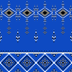 Geometric ethnic boho seamless pattern on a blue background. Native ethnic pattern. Tribal pattern. Aztec ornament. Ideas for wallpaper, tiles, elaborate borders, and textiles.