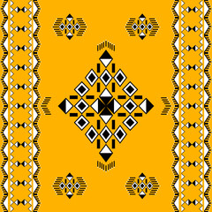 Geometric ethnic boho seamless pattern on an orange background. Native ethnic pattern. Tribal pattern. Aztec ornament. Ideas for wallpaper, tiles, elaborate borders, and textiles.