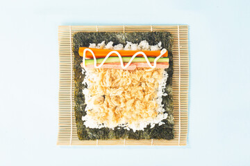 Close up of the process of making delicious sushi