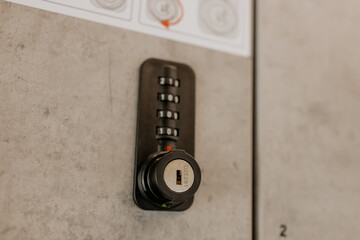 Close up of modern secure storage lockers with digital code locks and user instructions, located in...