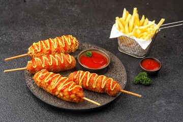 Corndog is a food made from skewered sausages (usually hot dogs) coated in a thick layer of...
