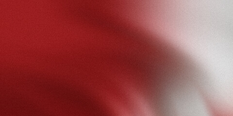 A vibrant gradient of red and white creates an abstract textured background with a grainy, noisy effect