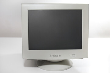 A front view of an old-fashioned monitor, a symbol of past computing eras.