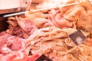 Raw cow tripe on counter of butcher shop