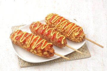Corn dogs or corndog are a typical South Korean snack that combines sausages with thick flour dough