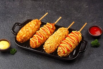 Corndog is a food made from skewered sausages (usually hot dogs) coated in a thick layer of...