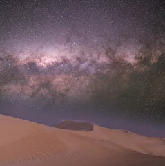 Selbstklebende Fototapeten Cappuccino Milky Way over Desert Dunes  © Wirestock