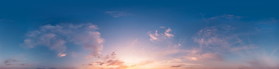Sunset sky with bright glowing pink Cirrus clouds. Seamless spherical HDR 360 panorama. Full zenith...