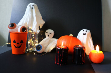 Set of various elements for Halloween. Jack o lantern glass is filled with eyes. Orange and black...
