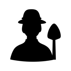 Silhouette of person with shovel ready to work in black and white