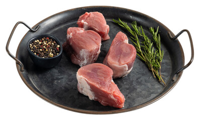 Fresh raw pork tenderloin medallions on a dark tray with herbs and peppercorns, isolated transparent background, detailed textures, appetizing appearance