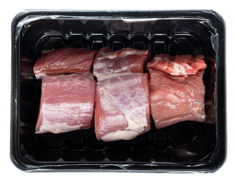 Fresh raw pork fillet medallions on black plastic tray isolated on transparent background, meat cut, tenderloin, butcher quality, healthy protein, culinary ingredient, red and pink hues, textured mea