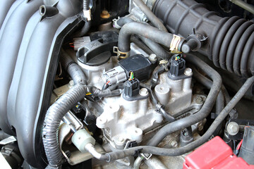 Fototapeta premium Car engine head cover with oil filler neck. Valve cover. Car Engine spare part. Internal combustion engine. 