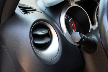 Car air conditioner ventilation grille. Automotive climate control. Airflow inside the car....