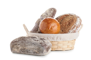 Basket with loaves of different fresh bread isolated on white background