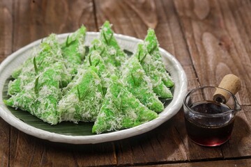 Lupisor Lopis is a typical Indonesian food. There are two commonly found shapes of lupis, namely triangular or elongated round like rice cakes. Lupis is made from cooked sticky rice, then wra