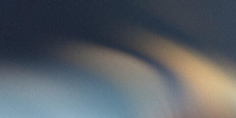 A grainy abstract background presents a blend of blue and brown tones in a soft gradient, creating...