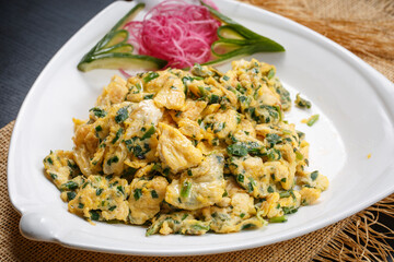 Delicious scrambled eggs with chives