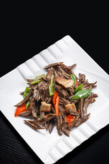 Stir-fried pork belly with bell pepper and pine mushrooms