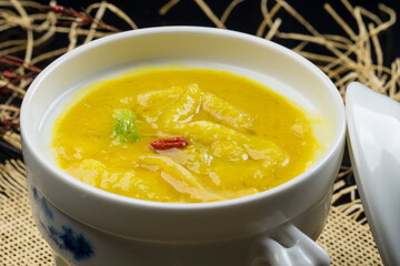Thick fish maw soup in white porcelain soup bowl