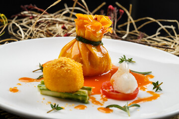 Fried dumplings with meat in round white porcelain plate
