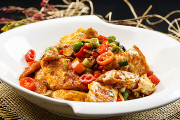 Hunan-style southern tofu in a round white porcelain plate