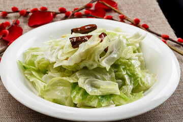 Shredded cabbage in white porcelain plate