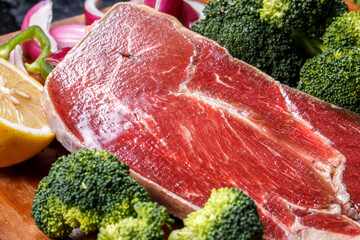 Beef shoulder triangle meat on a wooden cutting board