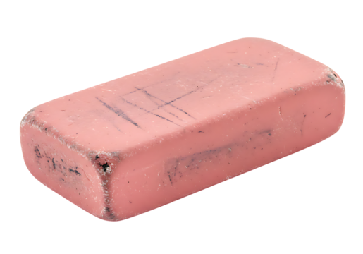 A used pink eraser shows wear and tear, featuring marks and debris from erasing pencil on transparent background.