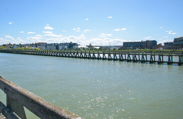 Scenic view of the riverfront pier in Rouen, France during a sunny day with clear skies