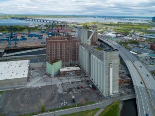 Aerial view of the iconic Farine Five Roses flour mill sign in Montreal. The historic landmark stands tall near the port and highway. Montreal, Quebec, Canada. 22 May 2024. © Zenstratus