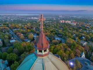 Aerial view from Saint Joseph's Oratory, Montreal, Canada. The copper dome and cross stand tall...