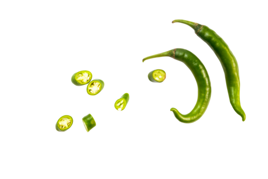 fresh green chili with slices of chili isolated on a white background