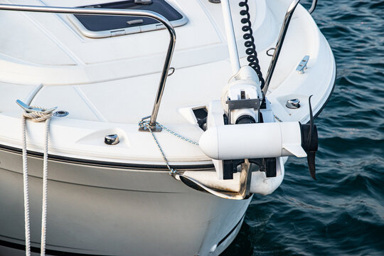 Modern small boat equipped with a bow-mounted electric trolling motor for quiet propulsion