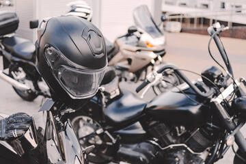 Black Motorcycle Helmet on Handlebars Ready for Adventure Ride