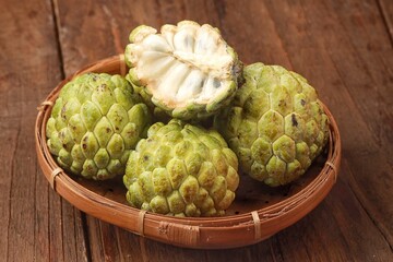 Srikaya fruit or cherimoya or annona squamosa or sugar apple is a type of tropical fruit that is thought to originate from the Andes mountains in South America.