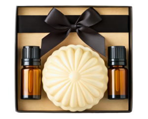Spa gift set with essential oil bottles and a soap bar on a transparent background