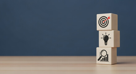 Stack of wooden blocks with target, lightbulb, and magnifying glass icons, symbolizing goal setting, innovation, and analysis on a blue background.
