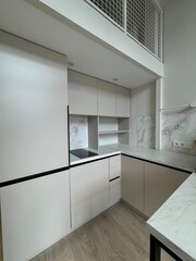 Compact Loft Kitchen Design with Marble Details