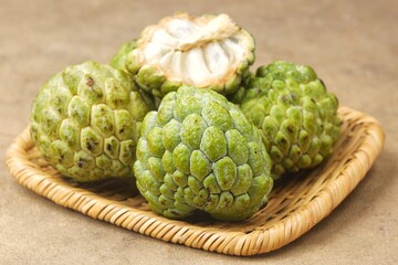 Srikaya fruit or cherimoya or annona squamosa or sugar apple is a type of tropical fruit that is thought to originate from the Andes mountains in South America.