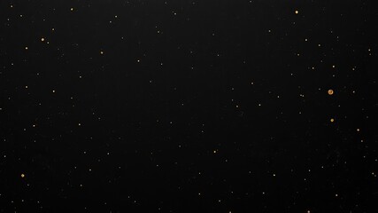 Fototapeta premium Abstract background texture with scattered golden particles on a dark black surface, ideal for elegant designs and presentations.