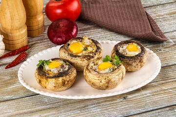 Baked champignon with quail egg