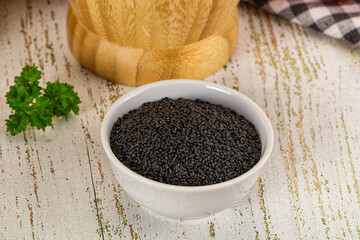 Black dry Nigella seeds in the bowl