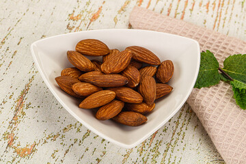 Tasty ripe almond nuts heap