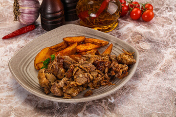 Baked shredded pork with potato