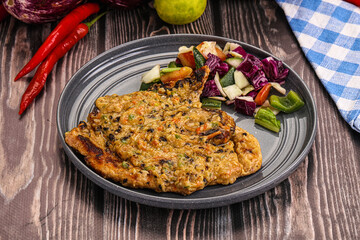 Tasty chicken steak with vegetables