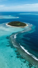 Aerial View of a Tropical Island Surrounded by Crystal-Clear Waters