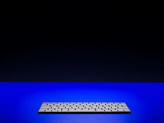 Keyboard on blue surface