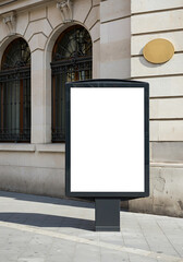 Blank vertical advertising billboard mockup on a classic city street