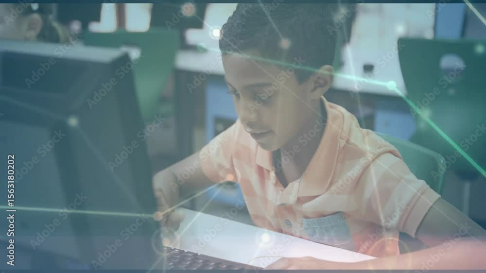 Poster boy touching keyboard and typing in lab, initiating animated network graphic illustrating coding